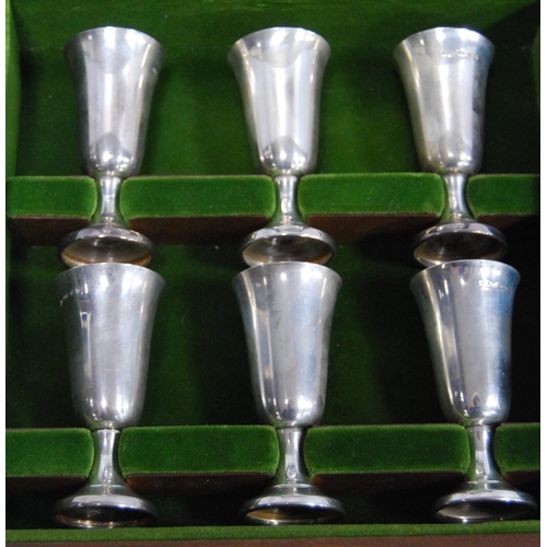 22 - Set of six plain silver kiddush cups, on spreading feet, with tray, Import Marks, 1991, cased.