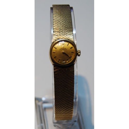 132 - Omega Automatic ladies 9ct gold bracelet watch, 1957, 35.6g gross.