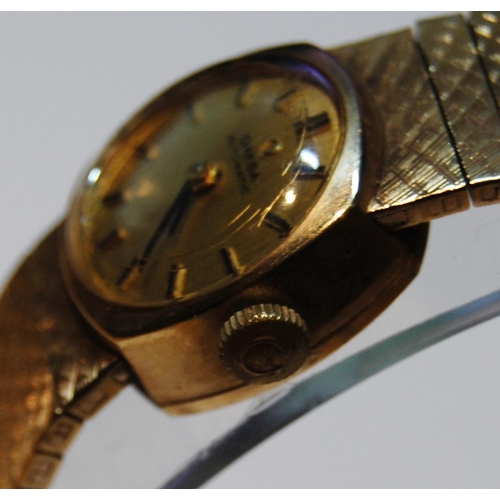 132 - Omega Automatic ladies 9ct gold bracelet watch, 1957, 35.6g gross.