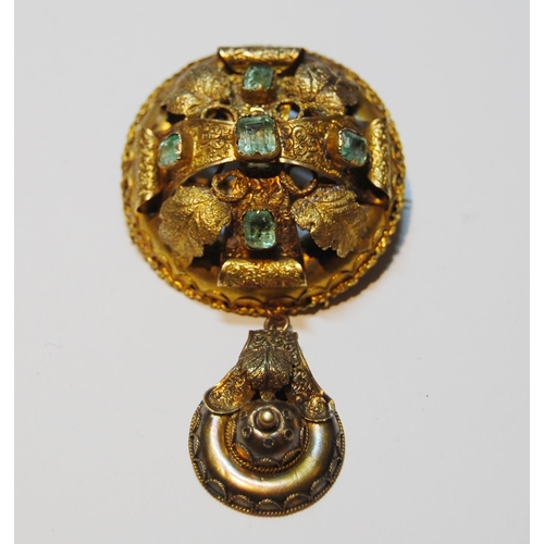 74 - Victorian gold circular brooch pendant with five foiled emeralds, probably 15ct, 10g.