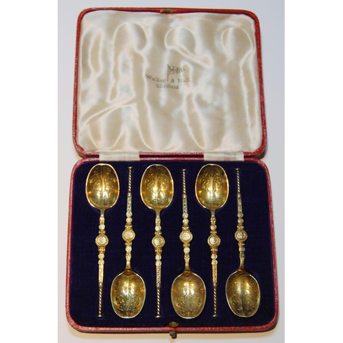 82 - Set of six silver gilt copies of the Anointing Spoon, 1915, cased.