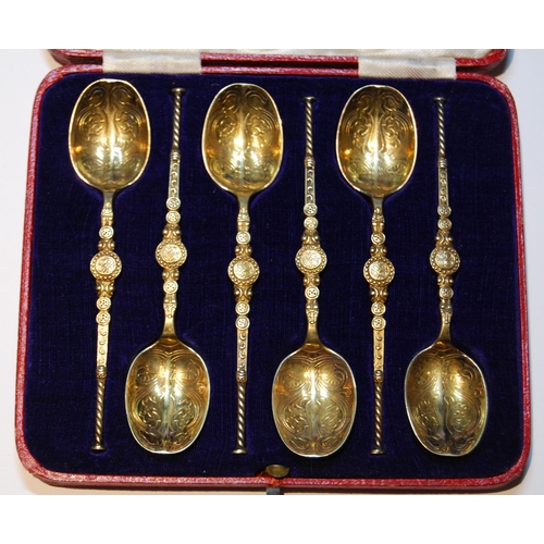 82 - Set of six silver gilt copies of the Anointing Spoon, 1915, cased.