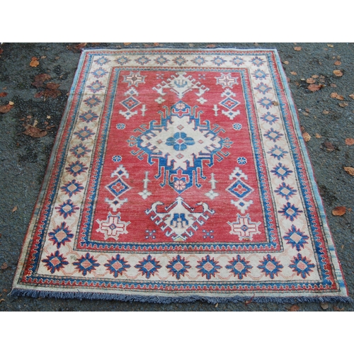 324 - Turkish Milas hand-knotted rug with central geometric medallion flanked by smaller geometric motifs ... 