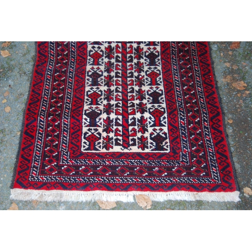 326 - Afghan Belouch hand-knotted rug with all-over geometric guls and motifs on red, blue and cream groun... 