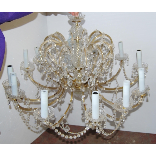 368 - Venetian-style glass chandelier with twelve scroll branches, decorated with pans, garlands and drops... 