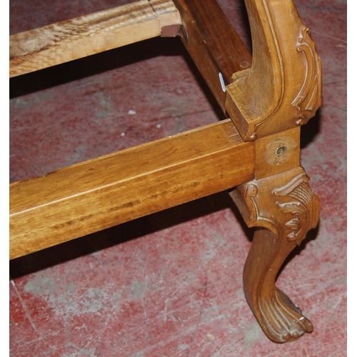 377 - French walnut double bed, the large carved head rest decorated with applied scrolls, with side rails... 