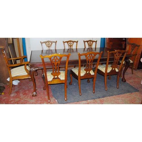 382 - Chippendale Revival dining table, 20th century, and a set of eight dining chairs, to include two car... 