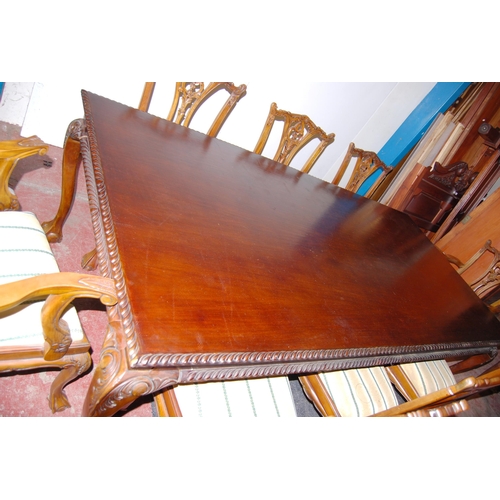 382 - Chippendale Revival dining table, 20th century, and a set of eight dining chairs, to include two car... 