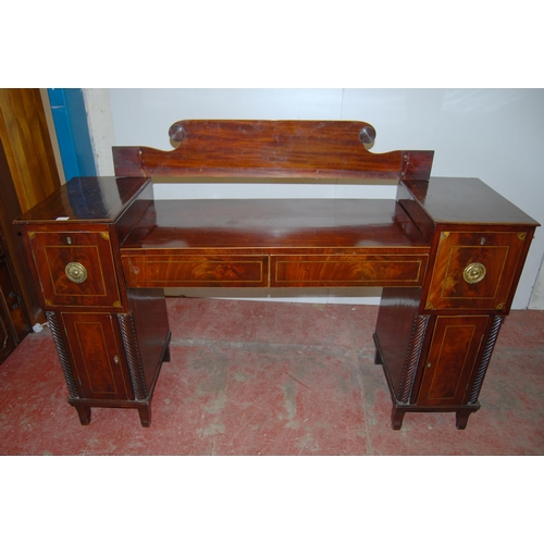 387 - Regency inlaid mahogany sideboard with scroll roundels to the pediment above two short drawers with ... 