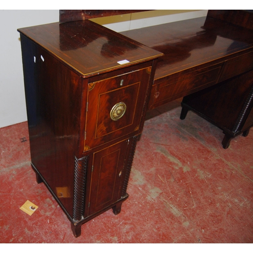 387 - Regency inlaid mahogany sideboard with scroll roundels to the pediment above two short drawers with ... 