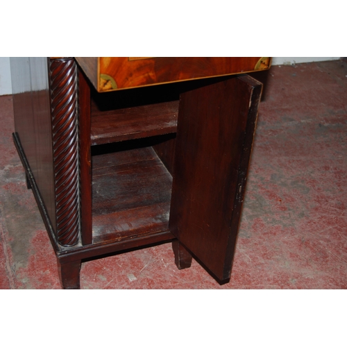 387 - Regency inlaid mahogany sideboard with scroll roundels to the pediment above two short drawers with ... 