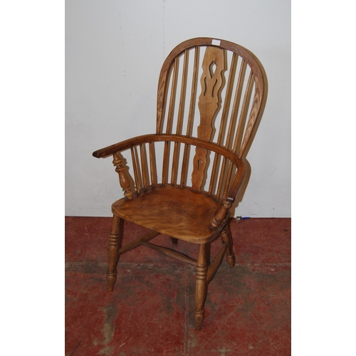 389 - Antique ash and elm Windsor armchair with hoop frame, stick back and pierced splat, on turned suppor... 