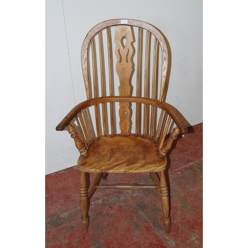 389 - Antique ash and elm Windsor armchair with hoop frame, stick back and pierced splat, on turned suppor... 