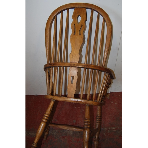 389 - Antique ash and elm Windsor armchair with hoop frame, stick back and pierced splat, on turned suppor... 