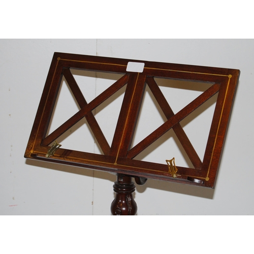 391 - Victorian-style mahogany and brass music stand on turned column and tripod supports with scroll feet... 