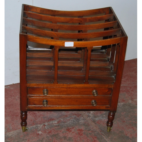 393 - Regency-style mahogany canterbury with four open divisions and two long drawers, on turned feet and ... 