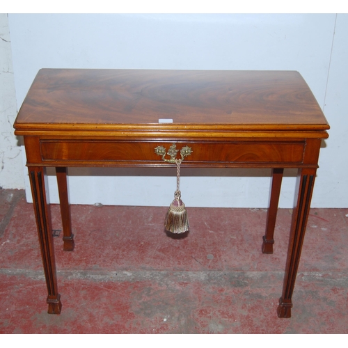 394 - George III style mahogany fold-over card table, the top enclosing a later green felt-lined interior ... 