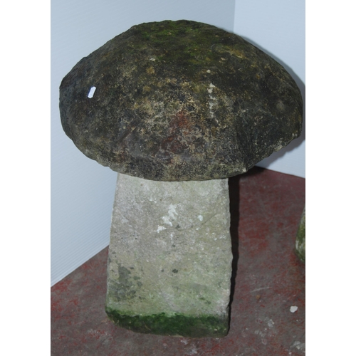 406 - Near-pair of antique garden stoneware staddle stones, each with a heavy mushroom-shaped top on colum... 