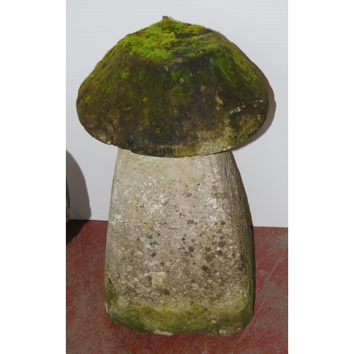 406 - Near-pair of antique garden stoneware staddle stones, each with a heavy mushroom-shaped top on colum... 