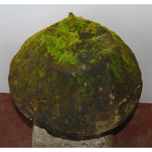 406 - Near-pair of antique garden stoneware staddle stones, each with a heavy mushroom-shaped top on colum... 