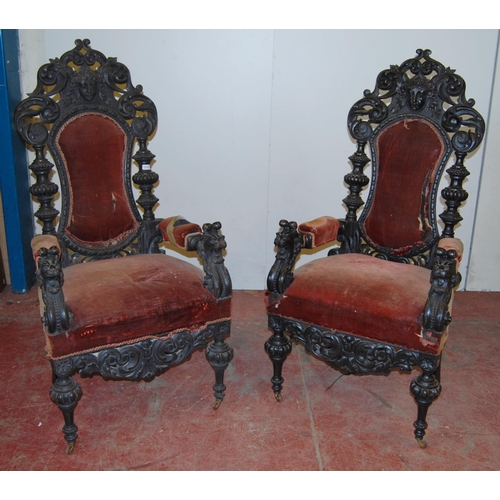 411 - Pair of Carolean-type throne armchairs, each with a shaped back rest decorated with scrolls and inse... 