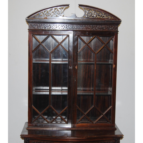 418 - Mahogany bonheur de jour with two glazed astragal doors enclosing a shelved interior above a serpent... 