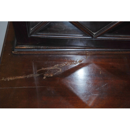 418 - Mahogany bonheur de jour with two glazed astragal doors enclosing a shelved interior above a serpent... 