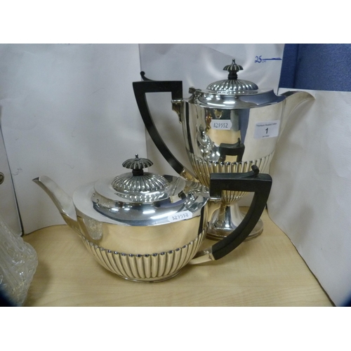 1 - Four-piece half reeded EP tea set and a claret jug with EP mount.