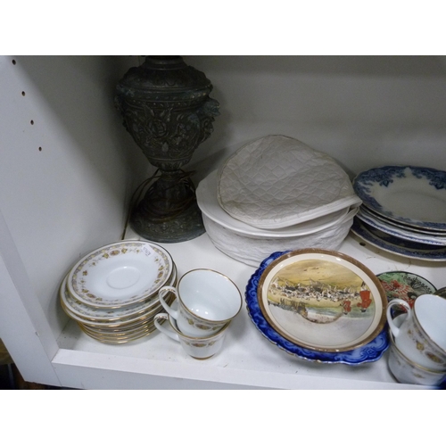 106 - Set of Salter scales, picnic basket, cookery books, blue and white plates, lamp etc (two shelves).