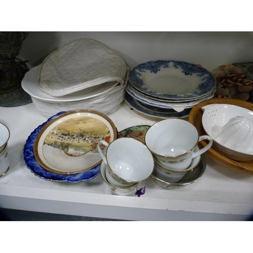 106 - Set of Salter scales, picnic basket, cookery books, blue and white plates, lamp etc (two shelves).