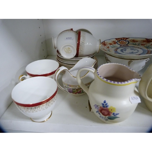 113 - Large blue and white ewer, similar vase, part tea set etc (one shelf).