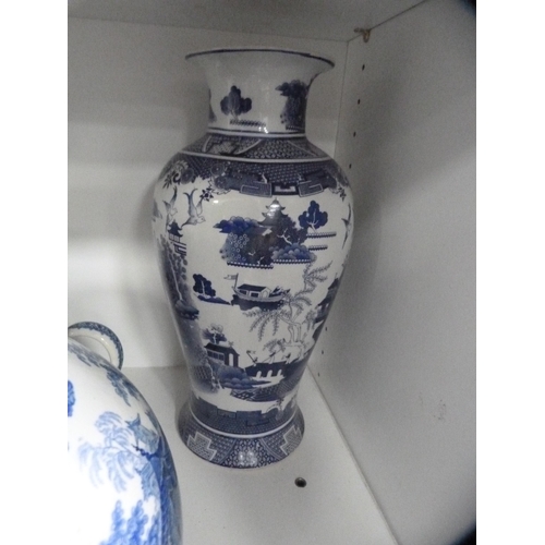 113 - Large blue and white ewer, similar vase, part tea set etc (one shelf).