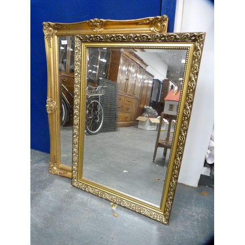 134 - Two rectangular gilt framed wall mirrors.  (2)