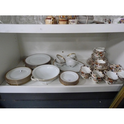 137 - Noritake part gilt dinner set and a Burnam part tea set (one shelf).