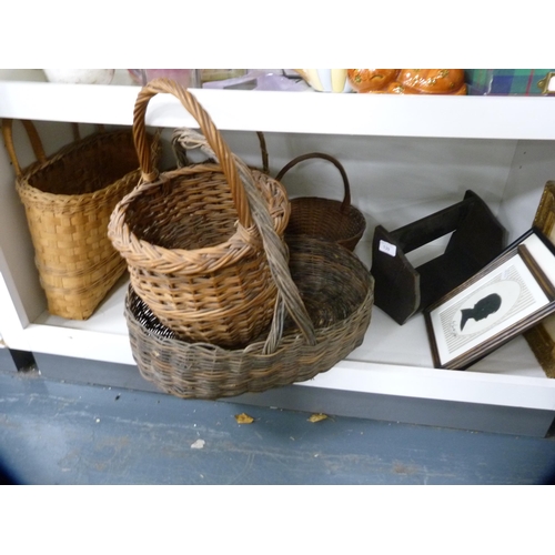 139 - Collection of wicker baskets, book trough and three pictures (one shelf).