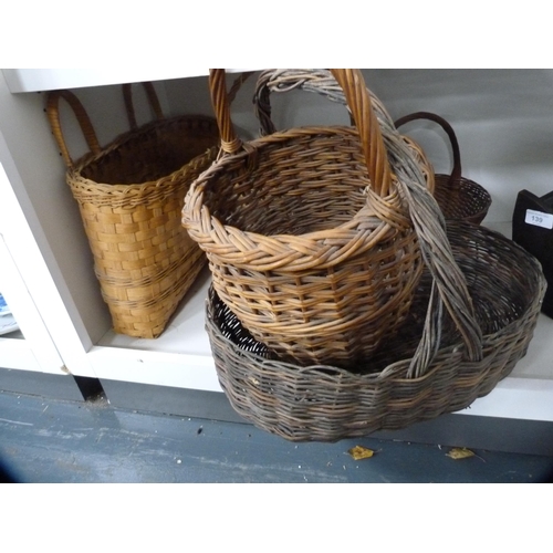 139 - Collection of wicker baskets, book trough and three pictures (one shelf).