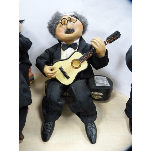 26 - Collection of humorous jazz band figures.