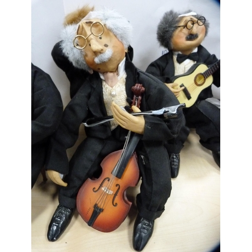 26 - Collection of humorous jazz band figures.