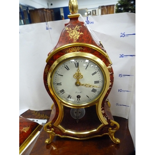 4 - Zenith red lacquered pendulum clock with instructions.