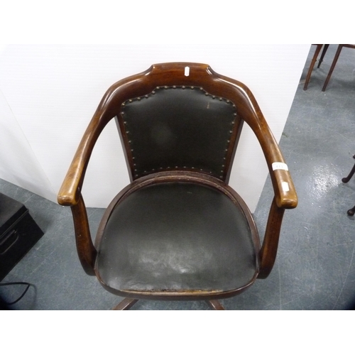 413 - Oak-framed swivel office chair.