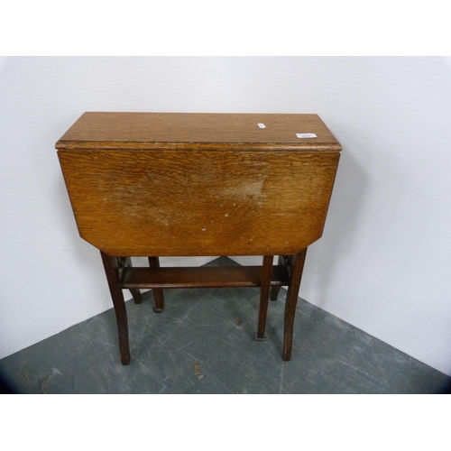 425 - Oak drop-leaf occasional table and a stool.