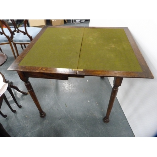 429 - Oak writing table with inset leather top.