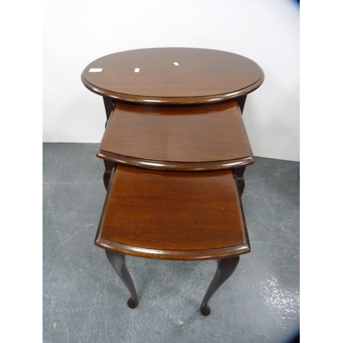 430 - Nest of three mahogany tables and a similar wine table.