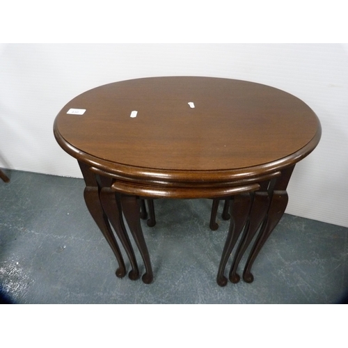 430 - Nest of three mahogany tables and a similar wine table.