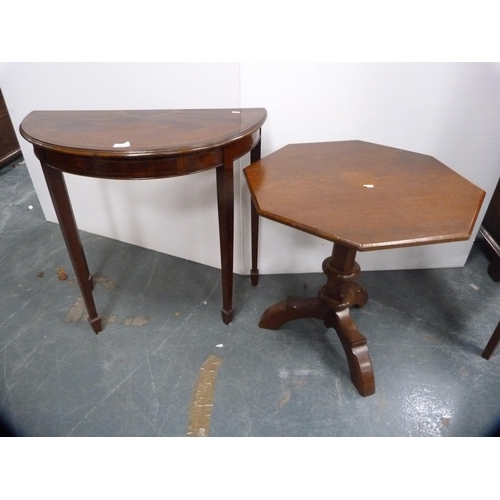 439 - Victorian-style mahogany octagonal table and an inlaid mahogany demi-lune table.  (2)