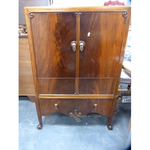 443 - Mahogany tallboy enclosed by cupboards and drawers.