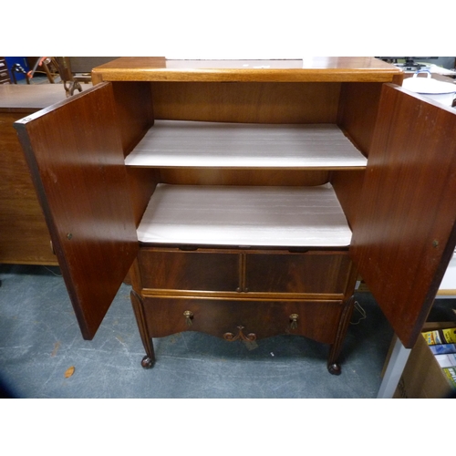 443 - Mahogany tallboy enclosed by cupboards and drawers.