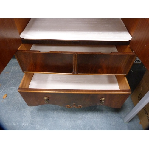 443 - Mahogany tallboy enclosed by cupboards and drawers.