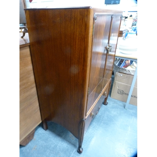 443 - Mahogany tallboy enclosed by cupboards and drawers.