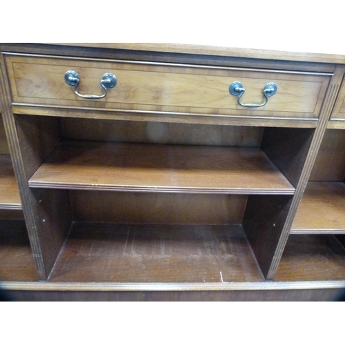 459 - Modern yew wood open display bookcase with drawers above.